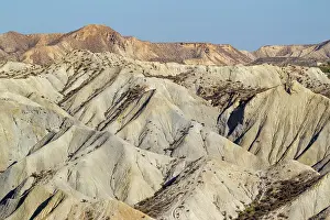 Ridges: Bare ridges of eroded sandstone in the badlands of the T