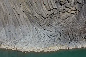 Columns: Basalt rock formations at canyon Studlagil - Austurland