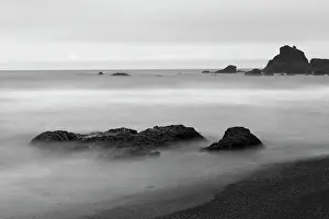 Stacks: Basalt sea stacks in the ocean, Vik, Iceland