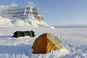 Tents: Basecamp with tents on snowy landscape at Spitsbergen
