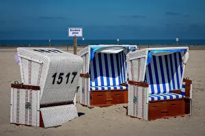 Chairs: Beach chairs with sign Strandkorbgrenze, beach