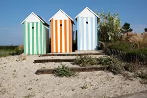 Paul Felix: Beach Huts on a traffic roundabout