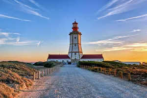 Ship: Beautiful of coastal lighthouse in warm colors of