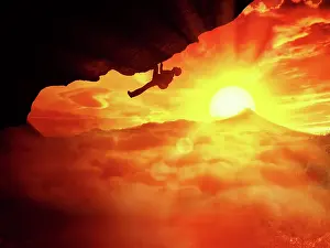 Mountaineer: Beautiful sunset background and an alpinist determined