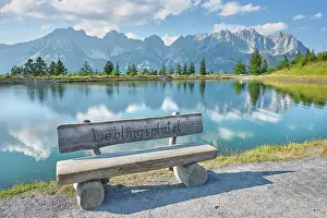 Bench: Bench in front of Astbergsee with reflection of