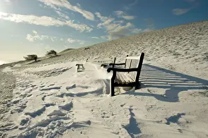 Benches: Benches covered in snow