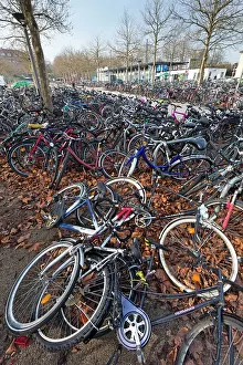 Bicycles: Bicycles - parked at train station