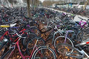 Bicycles: Bicycles - parked at train station