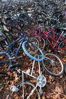 Bicycles: Bicycles - parked at train station