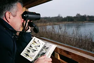 Hides: BIRD WATCHING - adult watching from hide