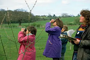 Binoculars: BIRD WATCHING - children, on a family wildlife weekend