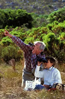 Binoculars: Birdwatching - adult and child with binoculars