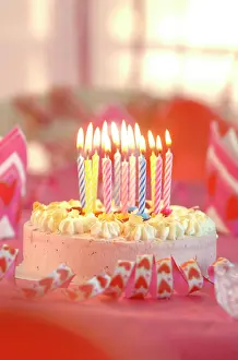 Celebrations: Birthday cake with burning candles