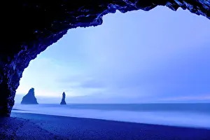 Hour: Black lava beach, basalt cave with basalt rocks