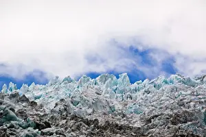 Westland: Blue glacial ice against sky and clouds