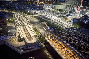 Bridge: Blue hour aerial view of the Hamburg Elbbrucken U4 underground and suburban railway station
