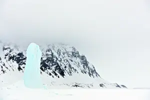 Pillars: Blue ice pillars in front of coast
