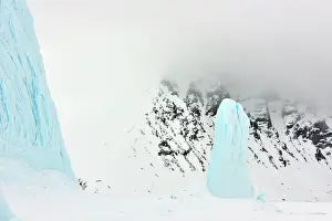 Pillars: Blue ice pillars in front of coast