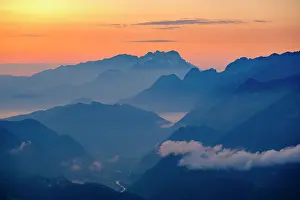 Hoher: Blue mountain silhouettes at sunrise, view over
