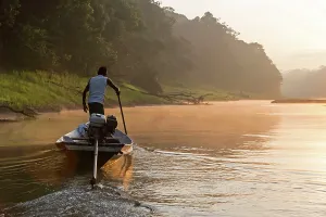 Tributary: Boat - sailing on tributary creek of the Rio