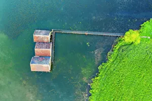 Kochel: Boathouses in Lake Kochel near Schlehdorf from above