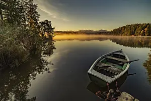 Boats: Boats in the autumnal Schmutter Weiher in the Allgau near the municipalities of Halblech