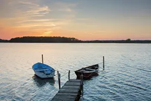 Pier: Boats on the lake at Neustadt in Holstein at sunset