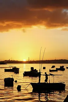 Havana: Boats silhouetted at sunrise, Havana Harbor