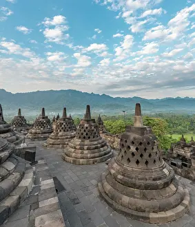 Java: Borobudur Temple Complex, cloudy sky, stupas, Borobudur
