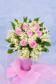 Bouquets: Bouquet of roses and lily of the valley