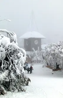 Buller: Bourke Street (ski run) and clock tower under snow