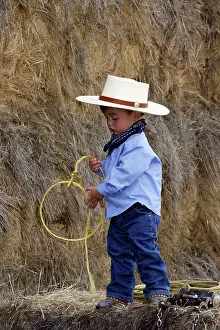 Ranches: Boy playing at being a cowboy