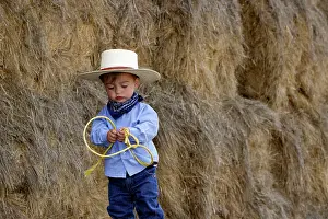 Ranches: Boy playing at being a cowboy
