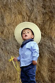Ranches: Boy playing at being a cowboy