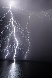 Strike: Branched lightning on Lake Geneva, during the stormy