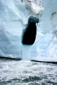 Pouring: Brasvell's Glacier - waterfall pouring from ice cave