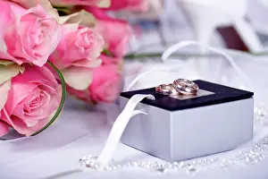 Celebrations: Bridal bouquet, wedding rings, wedding day still