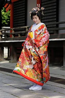 Custom: Bride wearing a traditional kimono in a Shinto wedding