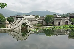 Hong: Bridge reflection, Hong Cun Village, Yi