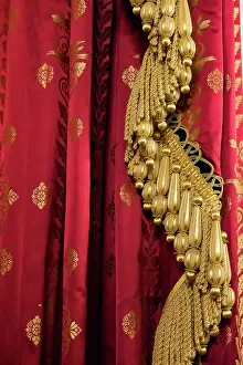 Gold: Brighton, England, United Kingdom. Red and gold fabric and