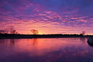 Loup: Brilliant sunset reflects into the Calamus