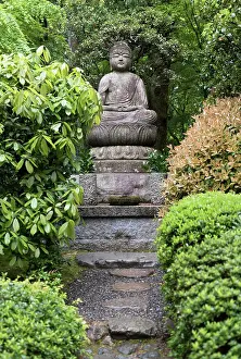Religions: Buddha statue in garden of Ryoanji, Ryoan-ji, Temple
