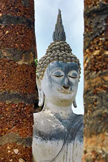 Statue: Buddha Statue between pillars, Wat Sa Si Temple, Sukhothai