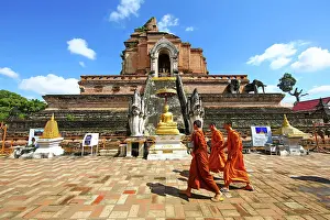 300517: Buddhist Monks at Chedi at Wat Chedi Luang Temple in Chi