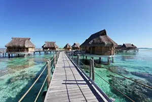 Atoll: Bungalows, water bungalows at the pier in lagoon