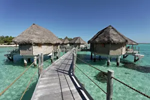 Atoll: Bungalows, water bungalows at the pier in lagoon