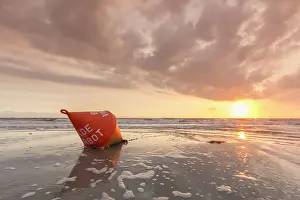 Wadden: Buoy in the evening in the mudflats - Wadden Sea