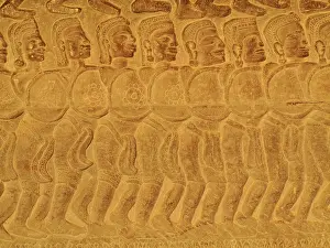 Khmer: Cambodia - Bas-reliefs of warriors at the east