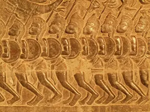 Khmer: Cambodia - Bas-reliefs of warriors at the west