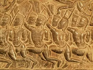 Khmer: Cambodia - Bas-reliefs of warriors at the west